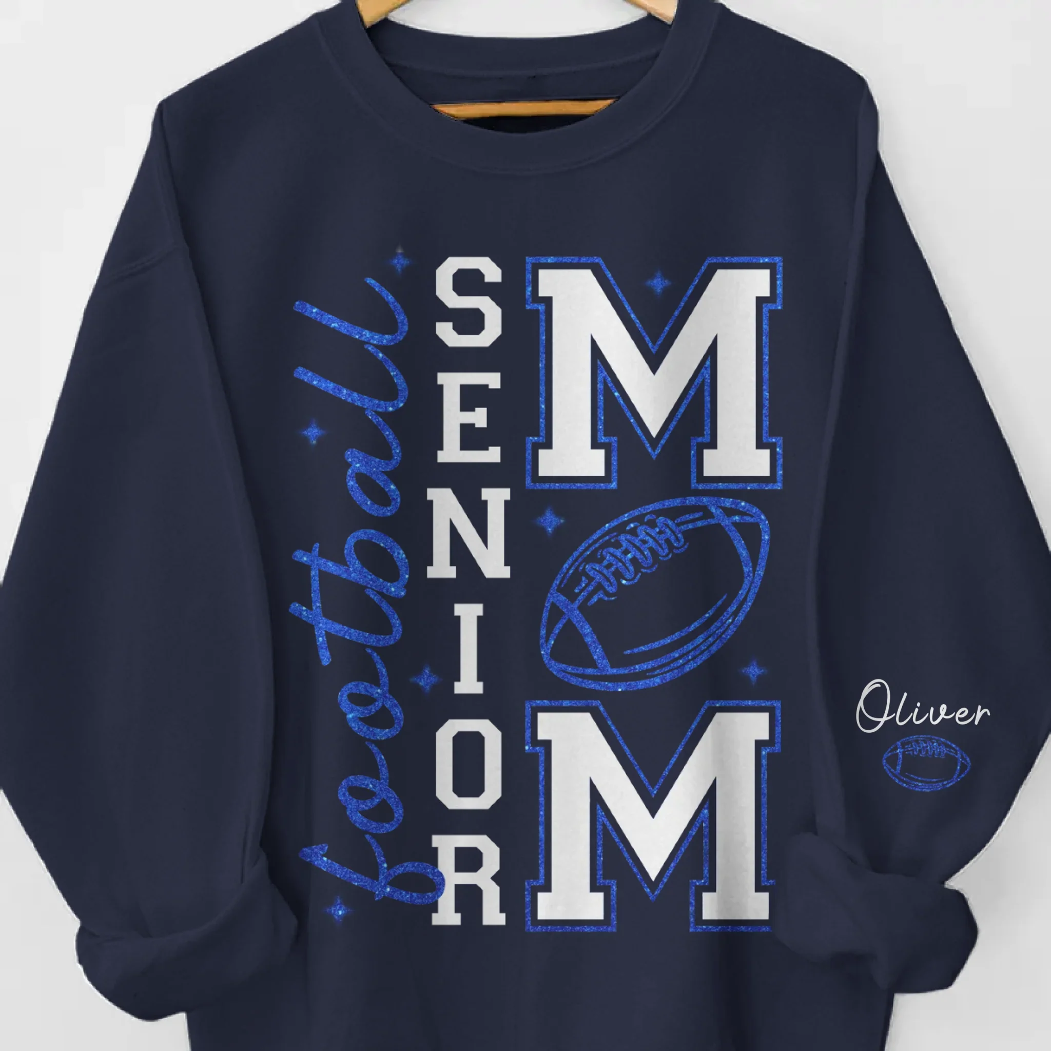 Custom Football Mom Unisex Sweatshirt, Hoodie With Design On Sleeve Personalized Birthday Football Gifts For Mom, Football Lovers, NFL Fans, Sport Lovers - Triumphant Senior Football Mama with Kid Name - Robaser
